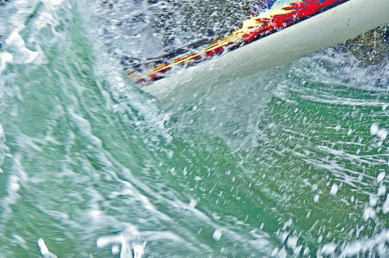 Kayaker Wave