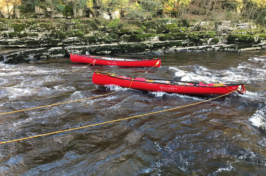 two canoes set up for tracking upstream. Photo credit Ken Hughes.