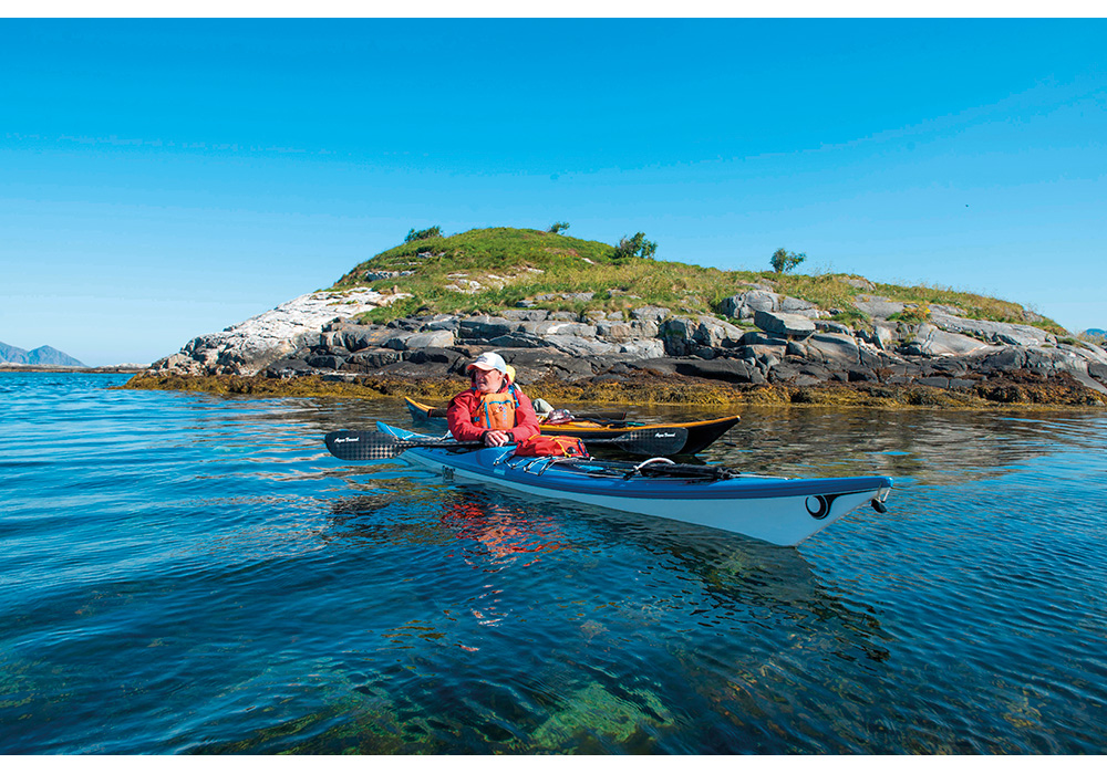 Sea kayaking in arctic norway