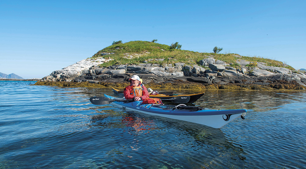Sea kayaking in arctic norway