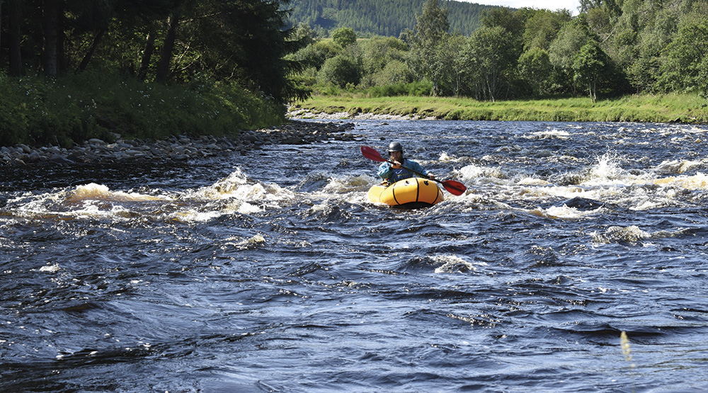 Packrafting on river spey
