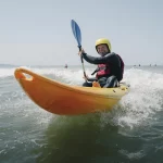 Big smiles with Simon Hammond and sit-on-top surf kayaking